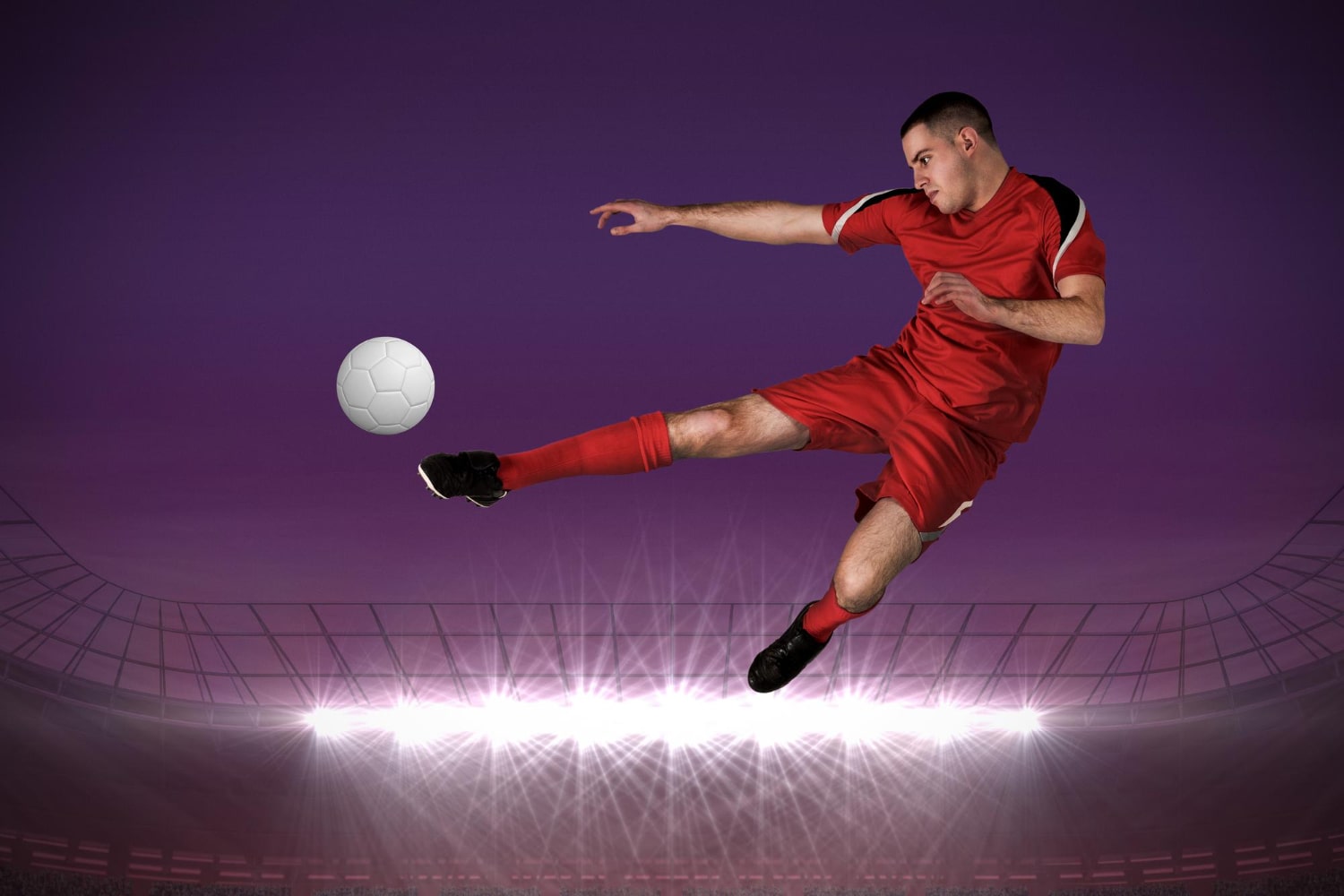 Football Player Kicking Under Stadium Lights and Purple Sky